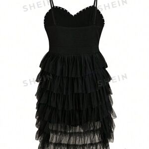 Black pearl neckline dress